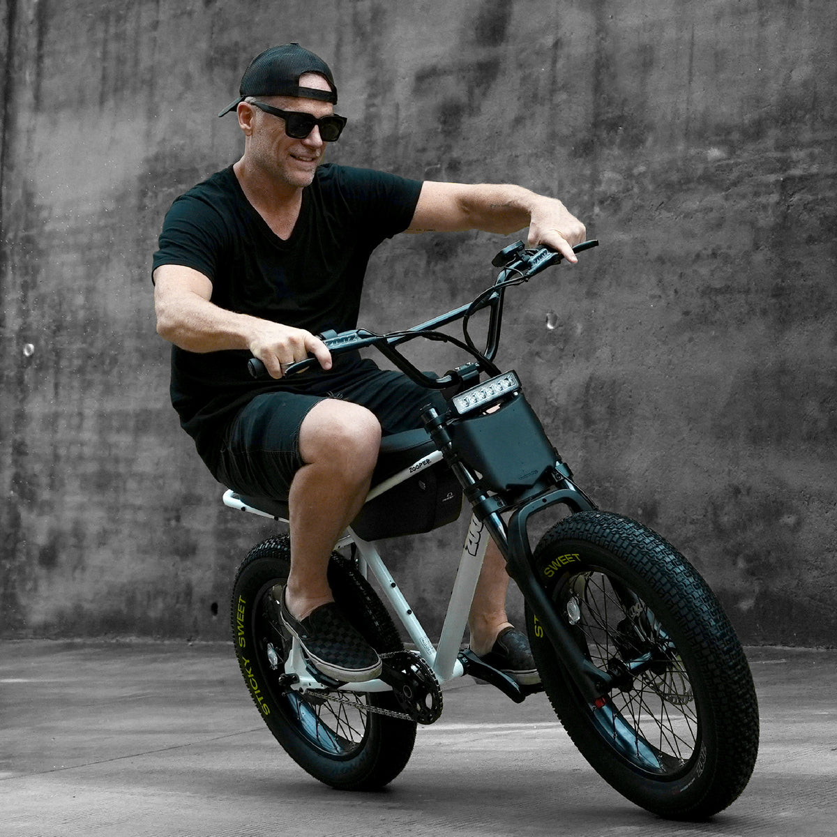 ZOOZ Electric Bikes Zooper spark white with rider